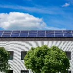 Solar panel mounted on home roof.