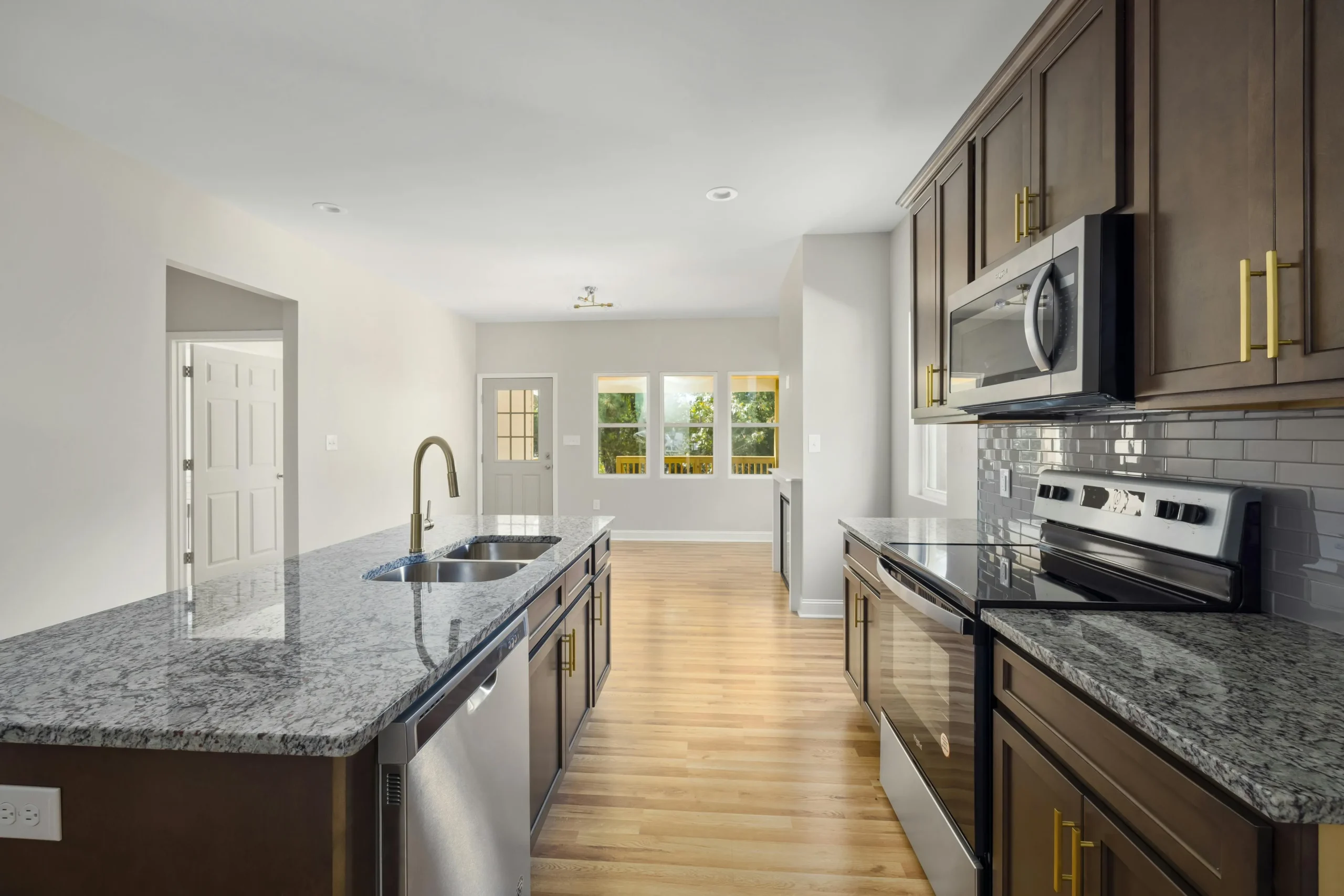 For your main image, use: "Modernized kitchen cabinets with unlacquered brass hardware for 2026.