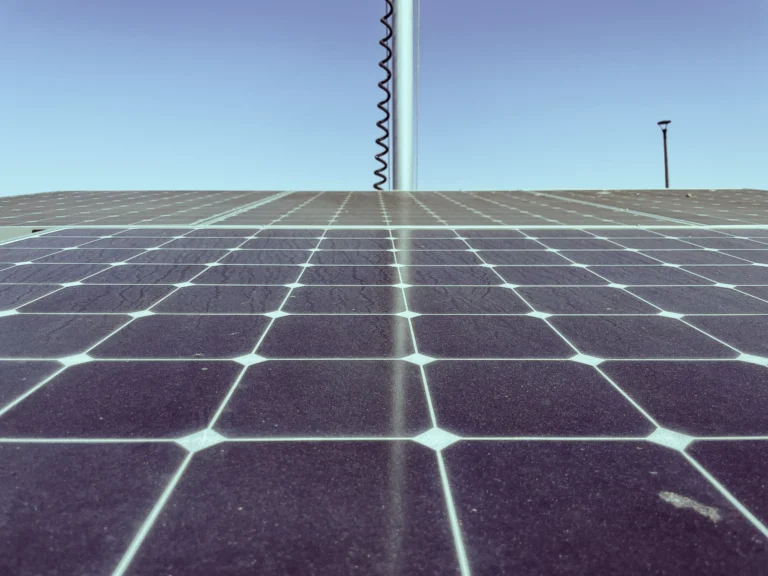 Dirty Solar Panels Increase Electric Bill. Dust and pollen buildup on a residential rooftop solar panel reducing energy output.