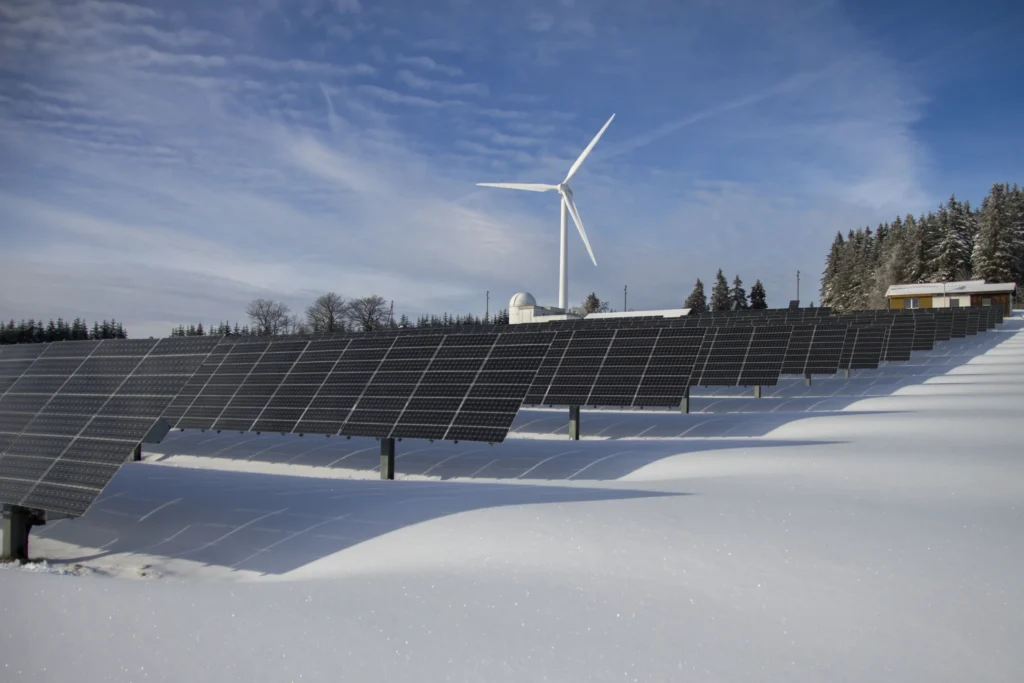 Gap between solar panels and roof surface where trapped snow can contribute to ice dam formation. solar panels in winter