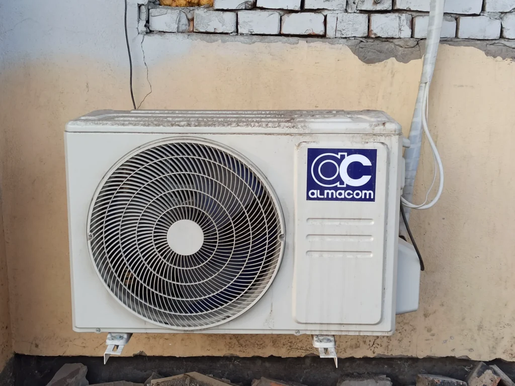 Dust and debris built up on outdoor air conditioning condenser fins.
signs your home air conditioning unit needs inspection.